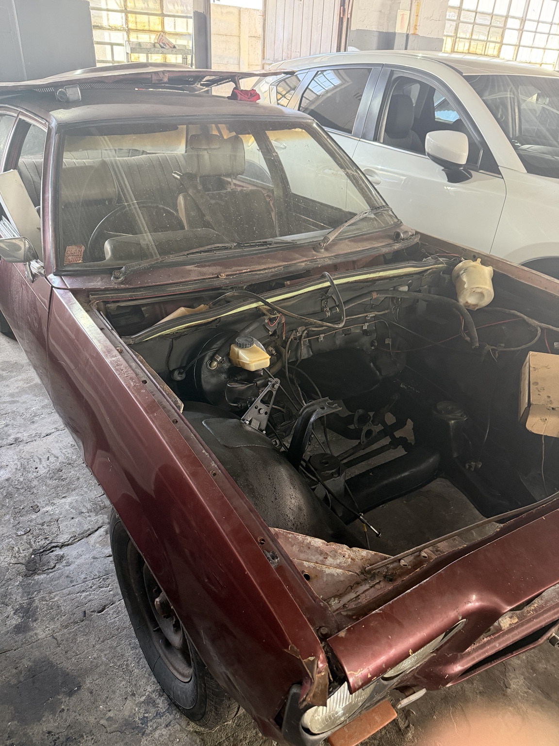 Maroon classic vehicle restoration project